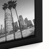 Extra large framed canvas featuring a textured depiction of the Los Angeles skyline in black with colorful accents.