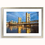 Textured abstract art print of Sacramento scenery in muted earth tones on a framed silver mat, suitable for bedroom decor.