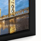 Close-up of textured black wall art featuring a colorful Sacramento scenery on a framed canvas.