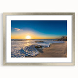 Textured abstract art print of San Diego scenery in muted blue tones, framed in silver, ideal for bedroom art.