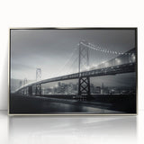 Mid-century modernist art depicting San Francisco skyline in muted gray and blue tones on a silver-framed acrylic print.