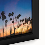 Framed canvas of a textured, colorful California coastline under a vibrant sunset, ideal for living room decor.