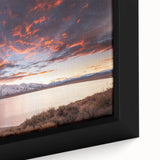 Extra large framed canvas featuring a textured depiction of the Sierra Nevada in black with vibrant, colorful accents.