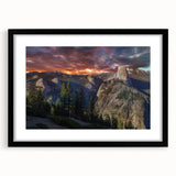 Colorful abstract art print of Yosemite in vibrant hues, framed in black, ideal for living room decor.