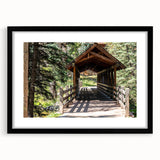 Abstract art print of a textured, colorful landscape, featuring earth tones and blues on a large framed canvas.