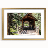 Extra large wall art featuring an abstract depiction of Vail, Colorado in textured gold and earth tones, framed with a mat.