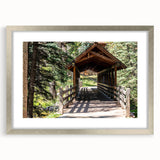 Textured art depicting an abstract Colorado Vail scenery in cool blue and white tones, framed with a silver mat.