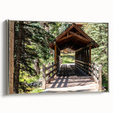 Framed canvas featuring a vintage-style landscape painting of Vail, Colorado.