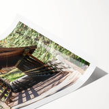 Extra large wall art featuring line art flowers in muted green and beige tones on a rolled canvas.