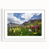 Abstract art print of Aspen trees in muted green and white, framed in white, suitable for dining room or bedroom decor.