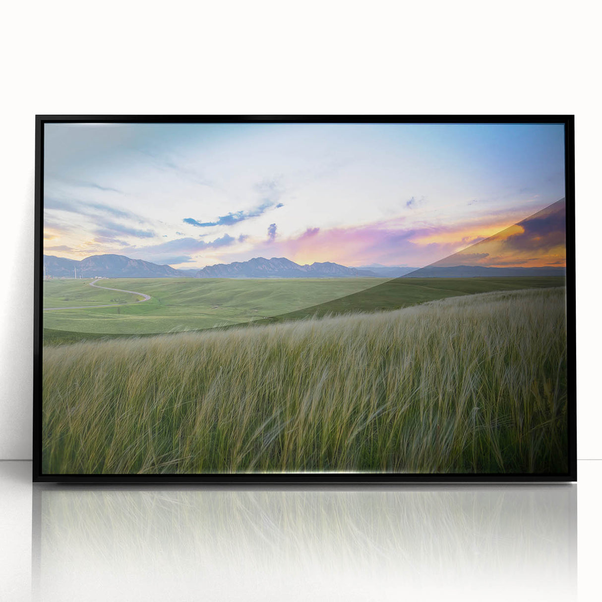 Large abstract wall art depicting a colorful Boulder, Colorado landscape on a black framed acrylic.