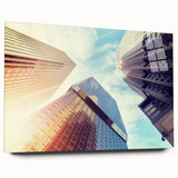 Large abstract wall art depicting the Denver skyline in muted gray and blue tones on acrylic glass.