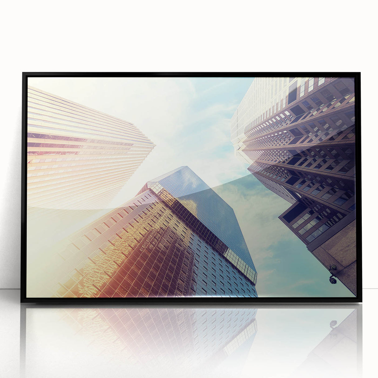 Large abstract wall art depicting Denver's skyline in muted gray and blue tones on a framed acrylic.