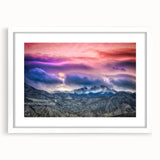 Abstract art print of Pikes Peak in muted earth tones, framed in white, ideal for dining room decor.