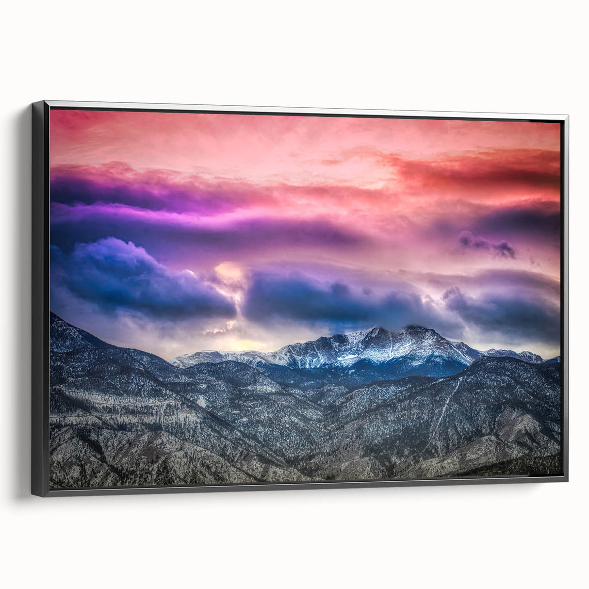 Black and white wall art featuring a vintage poster style landscape of Pikes Peak on framed canvas.