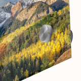 Large abstract wall art of the Rocky Mountains in muted earth tones on acrylic glass, ideal for dining room ambiance.