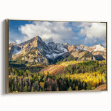 Framed canvas depicting the Rocky Mountains in Colorado, with a vintage poster art style and a black and gold color scheme.