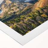 Art deco poster of the Colorado Rocky Mountains, rendered in muted earth tones on rolled canvas.