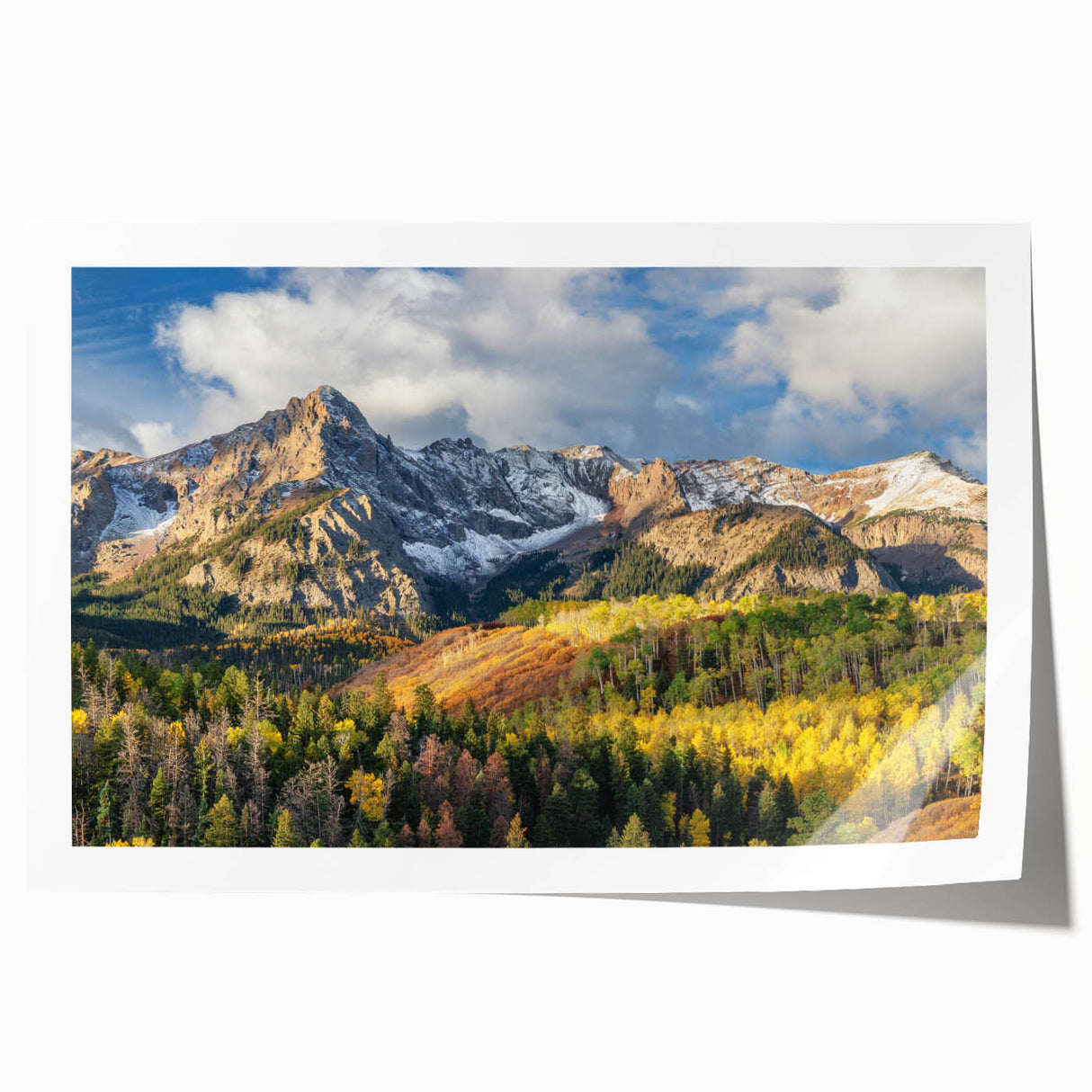 Rolled print of the Colorado Rocky Mountains in earthy tones, suitable as art wall for dining room.