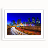 Abstract art print depicting Connecticut scenery in muted blue and green tones, framed in white.