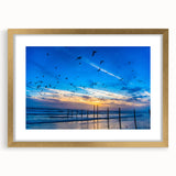 Extra large abstract art print of Daytona scenery in vibrant colors on a textured canvas, framed in gold.