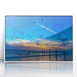 Art deco style poster of Daytona scenery on white acrylic, framed, with pastel blue and pink tones.