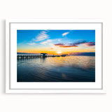 Abstract art print of Florida Keys in muted blue and green tones on a framed white canvas, ideal for dining room decor.