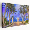 Palm trees and sunset over Florida beach on a large stretched canvas, with warm orange and blue tones.