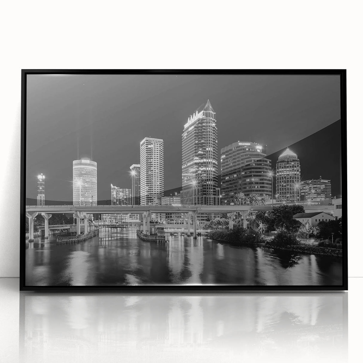 Large abstract wall art depicting the Tampa skyline in muted blue and gray tones on a framed acrylic print.