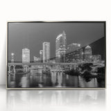 Mid-century modernist art depicting the Tampa skyline in muted blue and silver tones on a framed acrylic print.