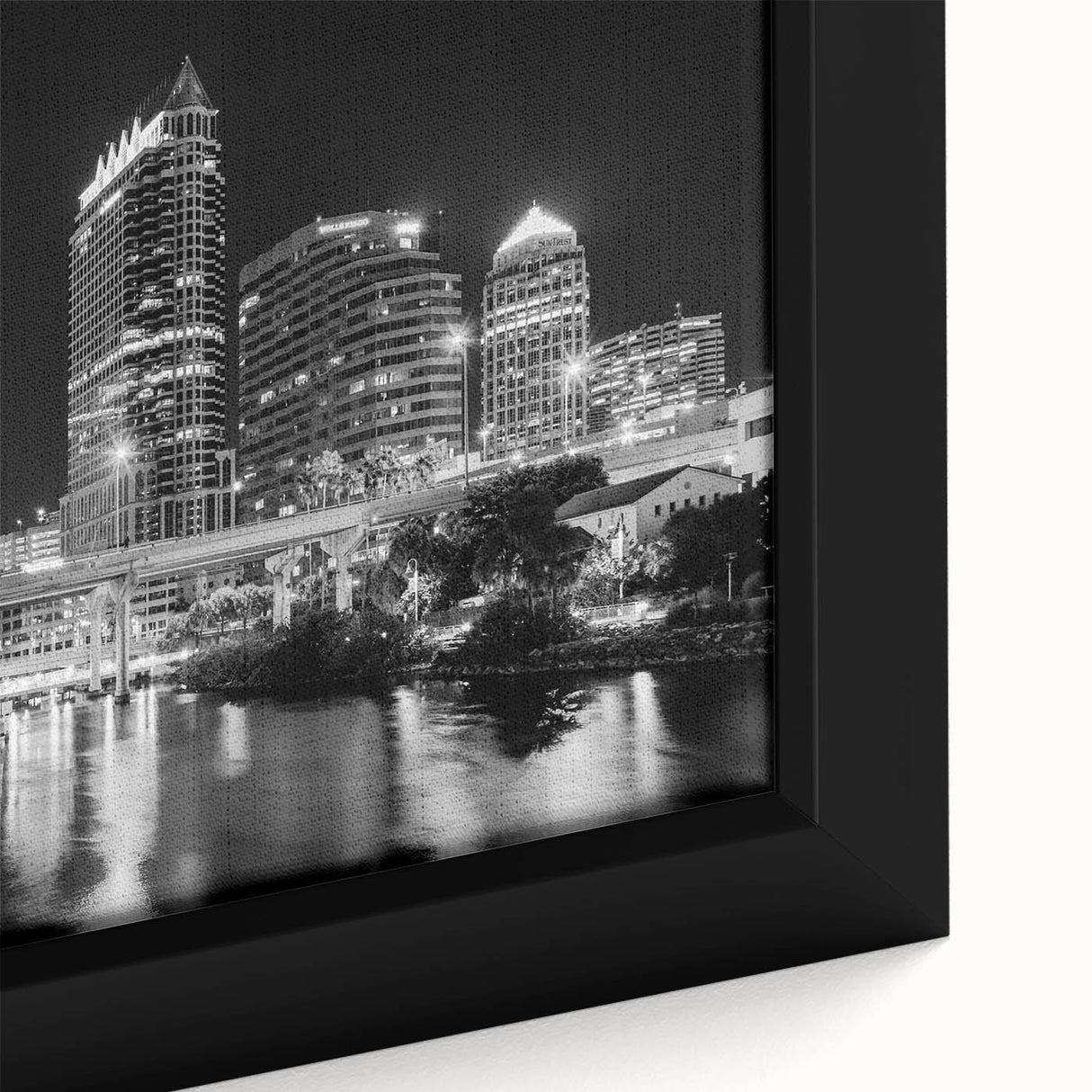 Extra large framed canvas featuring a textured depiction of Tampa's skyline in muted black and colorful art accents.