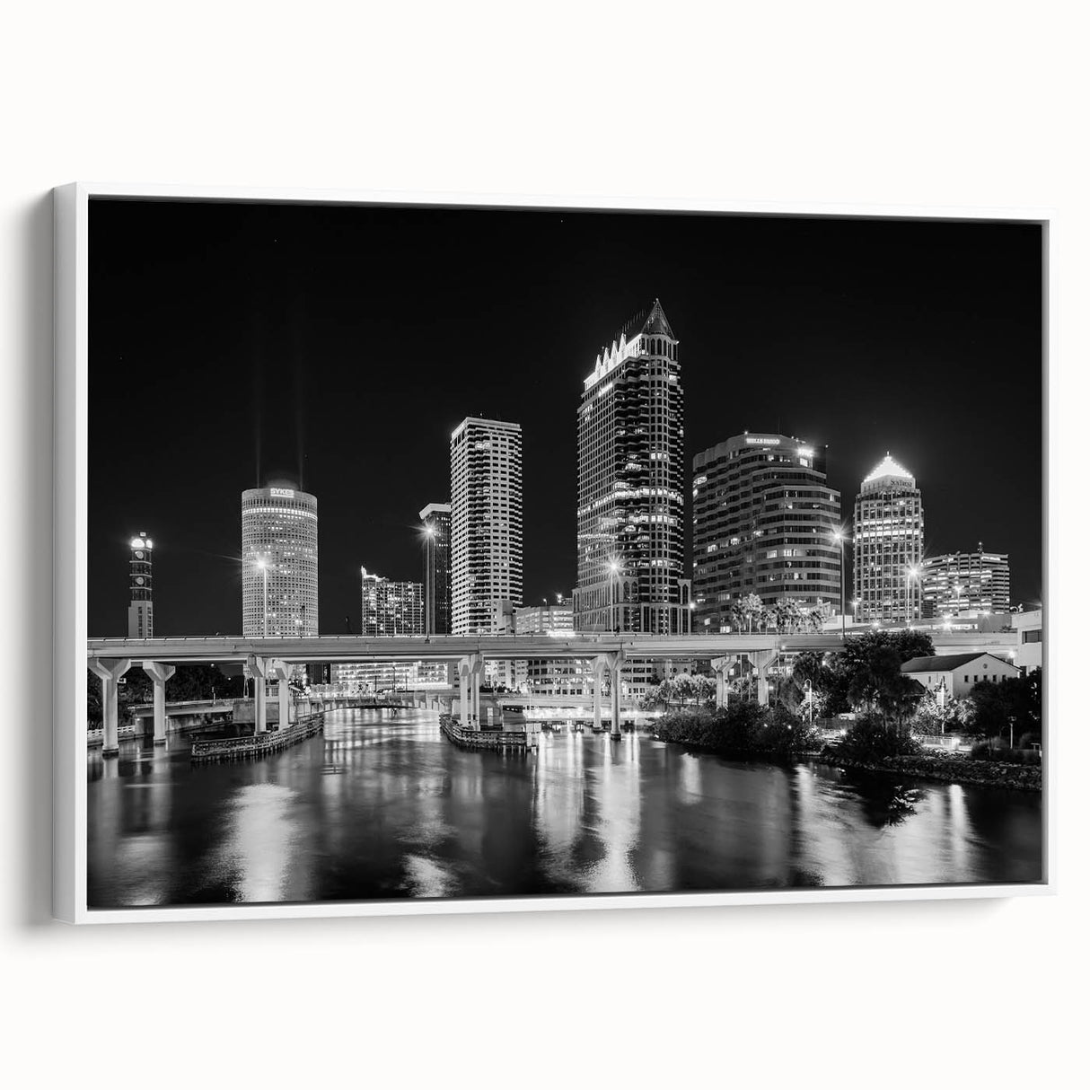 Framed canvas of vintage poster art depicting colorful Tampa, Florida scenery, ideal for living room decor.