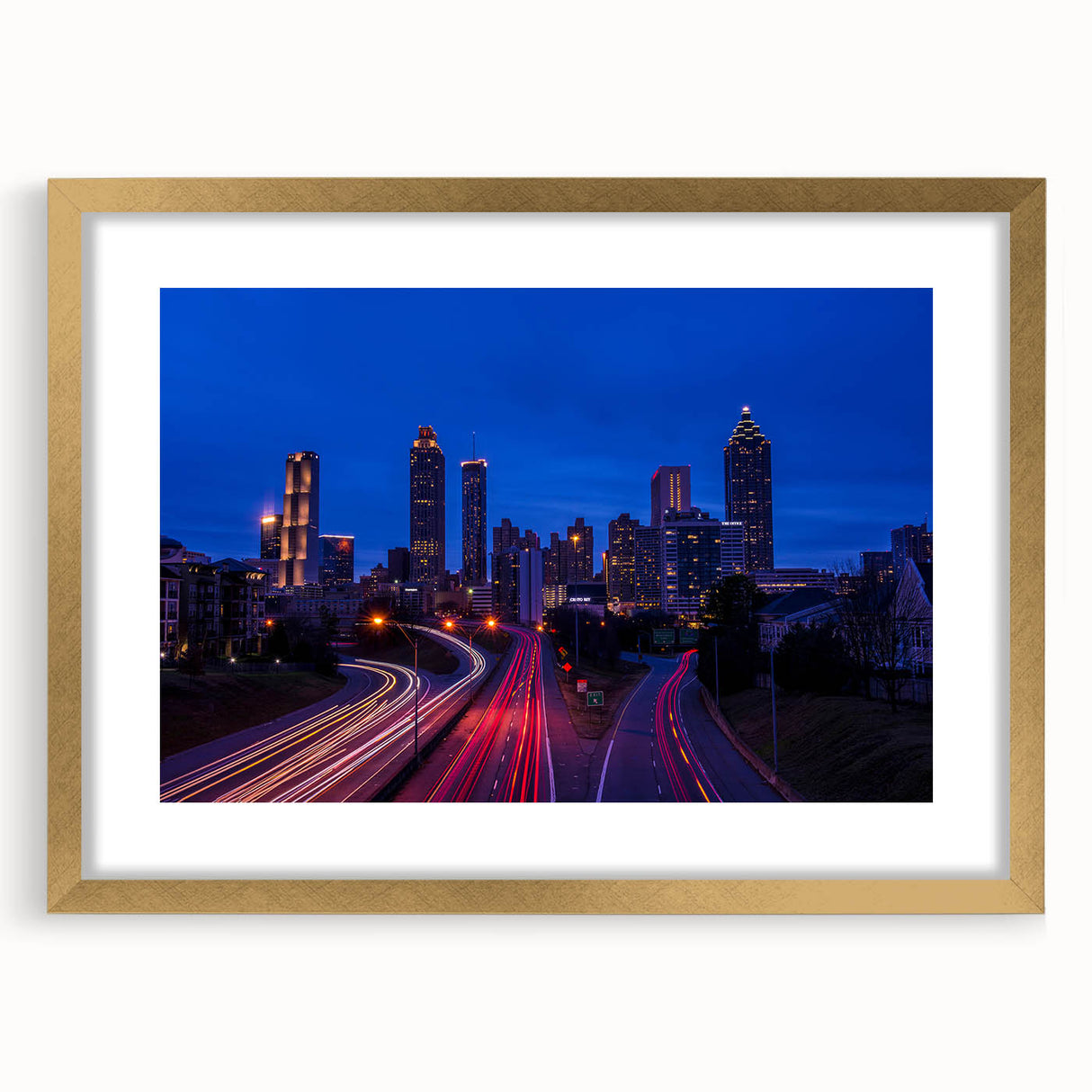 Extra large abstract art print of Atlanta skyline in muted gray and blue tones on a framed canvas.