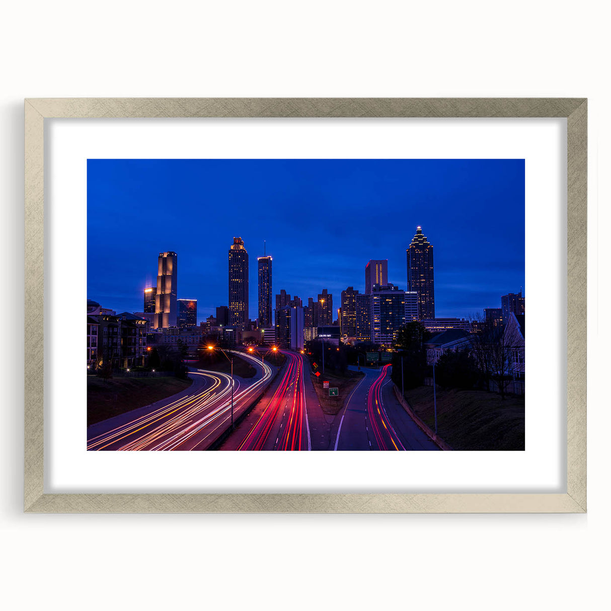 Textured abstract art print of the Atlanta skyline in muted gray tones on framed canvas, suitable for bedroom decor.
