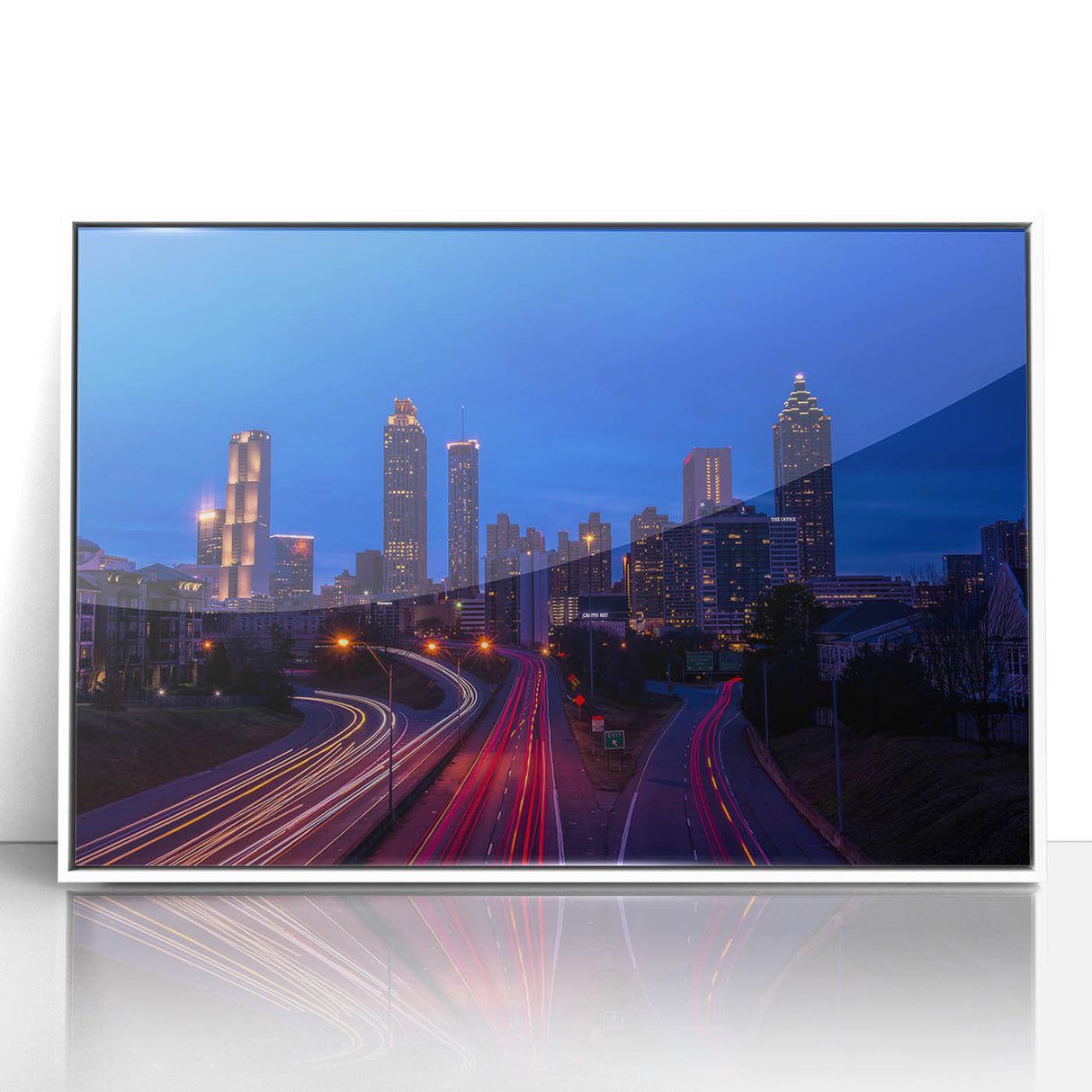 Art deco poster of Atlanta skyline in muted gray and blue tones on a framed acrylic, suitable for modern art wall decor.