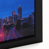 Framed canvas of the Atlanta skyline in textured black with colorful highlights, ideal for large living room walls.