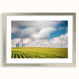 Textured abstract art print of a Kentucky landscape in muted earth tones, framed in silver, suitable for bedroom decor.