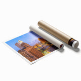 Rolled print of New Orleans scenery with floral elements in muted green and pink, ideal for classy bathroom wall art.