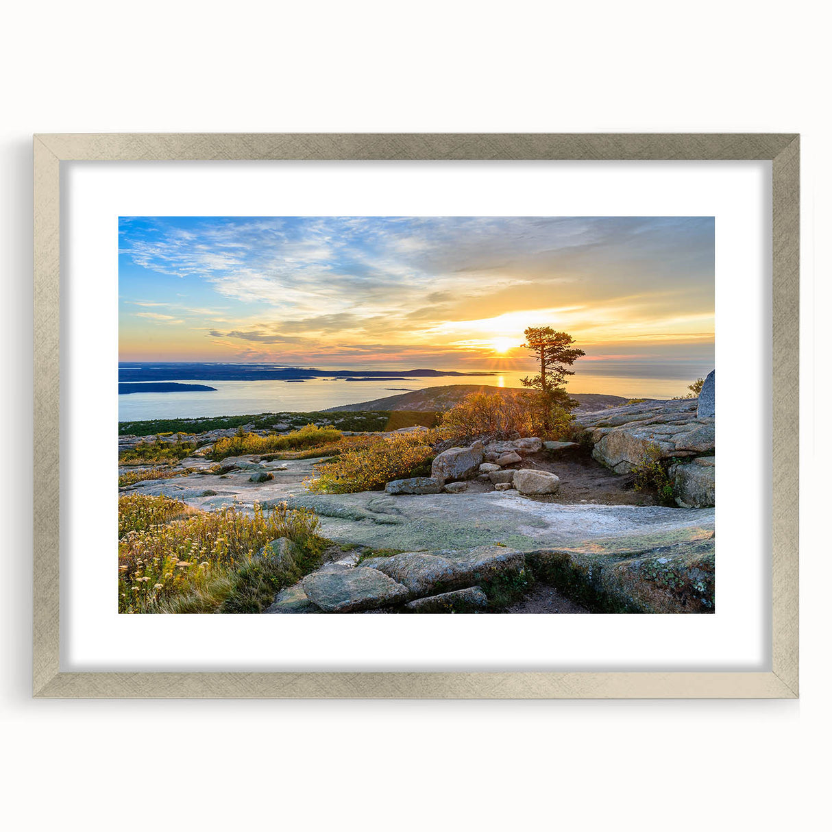 Textured abstract art print depicting Acadia's landscape in muted earth tones, framed in silver, suitable for bedroom decor.