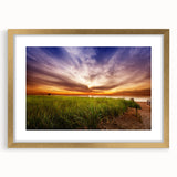 Extra large wall art depicting an abstract Maine scenery in textured gold and earth tones, framed with a mat.