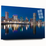 Large abstract depiction of Baltimore skyline in muted blue and gray on acrylic glass.