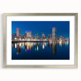 Textured abstract art print of Baltimore skyline in muted gray and silver frame, ideal for bedroom wall decor.