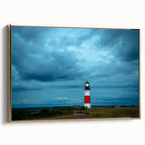 Framed canvas depicting a vintage-style landscape painting of Nantucket, featuring muted earth tones.