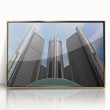 Acrylic print of Detroit skyline in gold and blue tones, framed, mid-century modernist style.