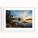 Abstract art print of Minnesota scenery in muted blue and green tones on a white-framed canvas.