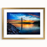 Extra large abstract art print of Kansas City skyline in muted gold and blue tones on a framed canvas.