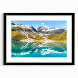 Abstract art print depicting Glacier National Park in vibrant, textured colors on a large framed canvas.