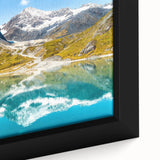 Extra large black wall art featuring a textured depiction of Montana's Glacier scenery on a framed canvas.