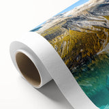 Art deco poster of Montana's Glacier scenery on rolled canvas, in soft blue and white tones, ideal for nursery wall art.