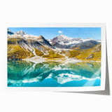 Rolled print of Glacier National Park with soft blue and green tones, ideal for art wall dining room decor.